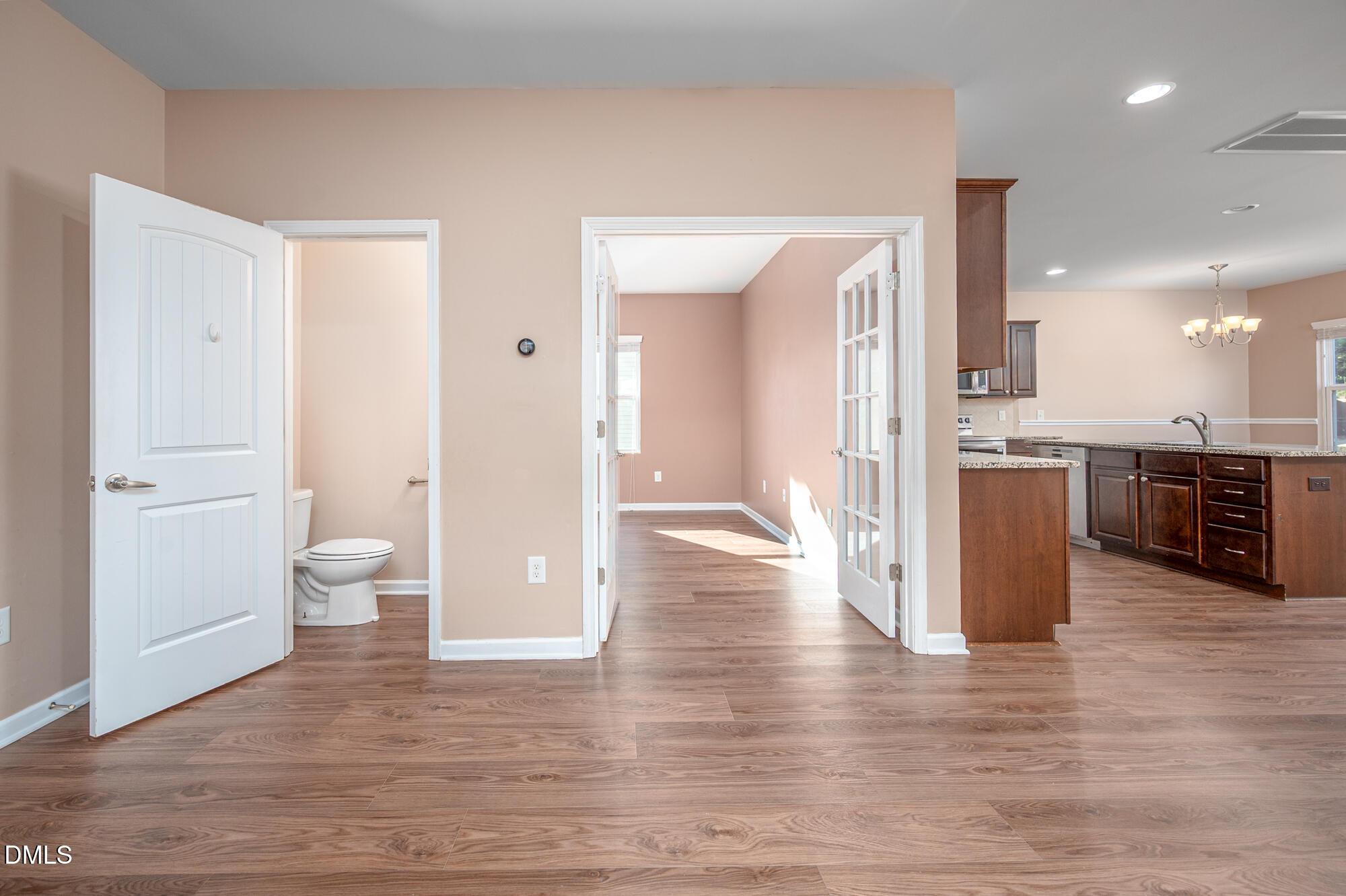 3548 Althorp Drive Raleigh, NC 27616 - Photo 6 of 56 a view of a kitchen with a refrigerator and a sink