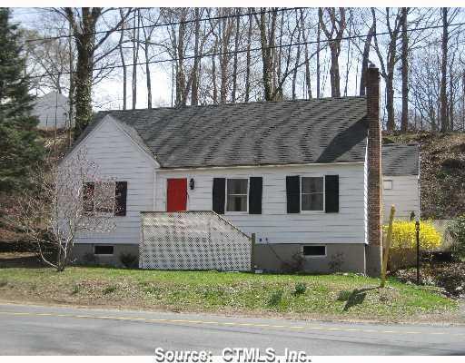 837 Dogburn Road Orange, CT 06477 - Photo 1 of 1 a front view of a house with garden