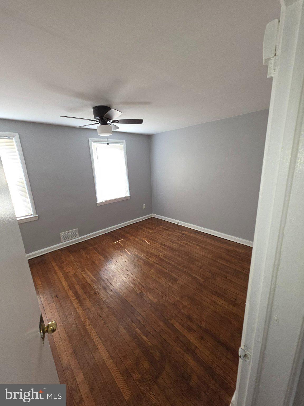 4404 Mountview Road Baltimore, MD 21229 - Photo 10 of 22 wooden floor in an empty room