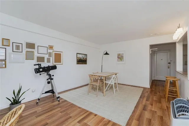 a view of a livingroom with furniture and a table