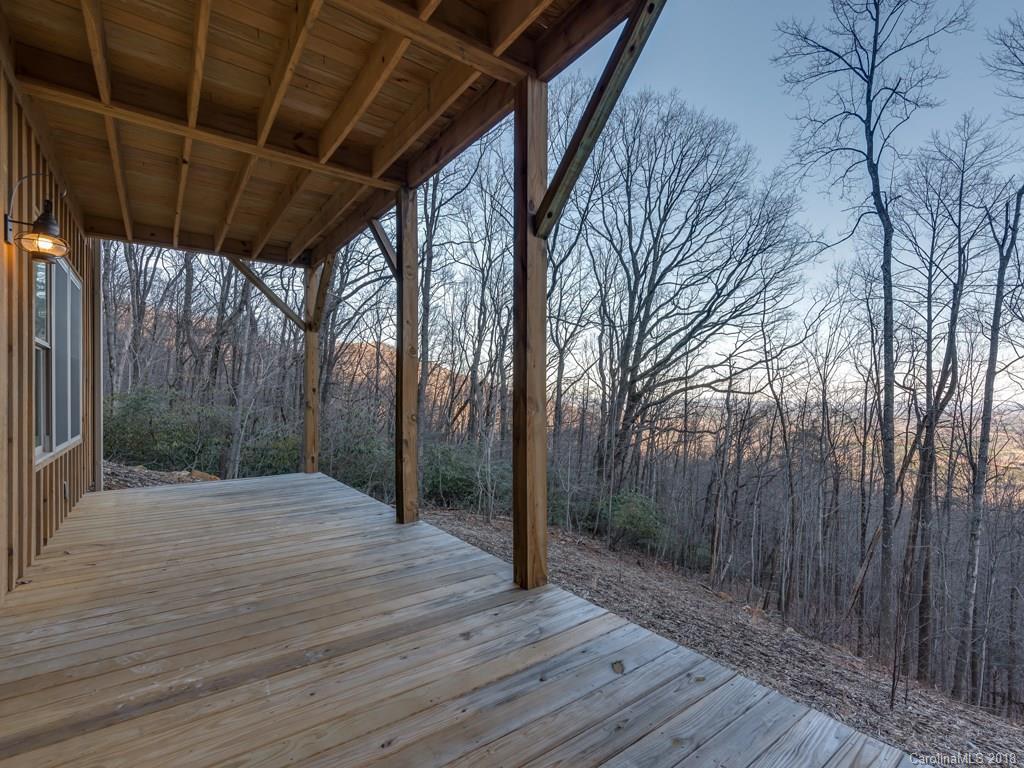 2189 Judes Gap Road Mill Spring, NC 28756 - Photo 18 of 22 a view of backyard with green space