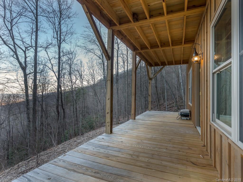 2189 Judes Gap Road Mill Spring, NC 28756 - Photo 19 of 22 a view of a porch