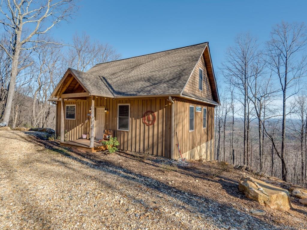2189 Judes Gap Road Mill Spring, NC 28756 - Photo 22 of 22 a front view of a house with a yard