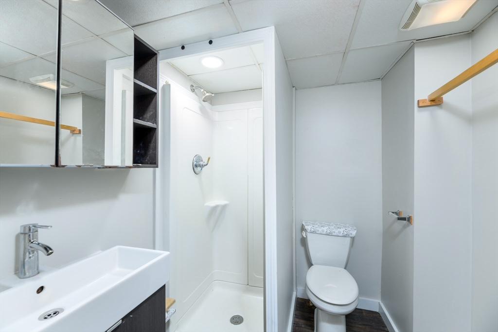 504 Main Street Sturbridge, MA 01518 - Photo 16 of 25 a bathroom with a sink toilet and shower