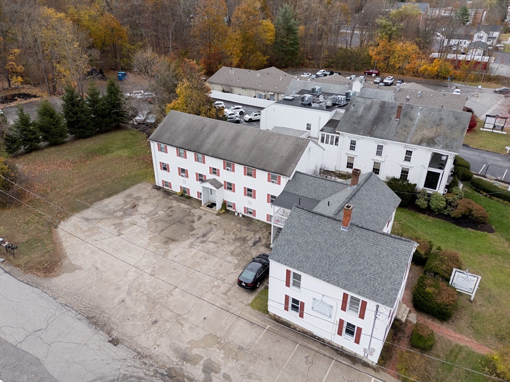 504 Main Street Sturbridge, MA 01518 - Photo 5 of 25 an aerial view of a house with outdoor space