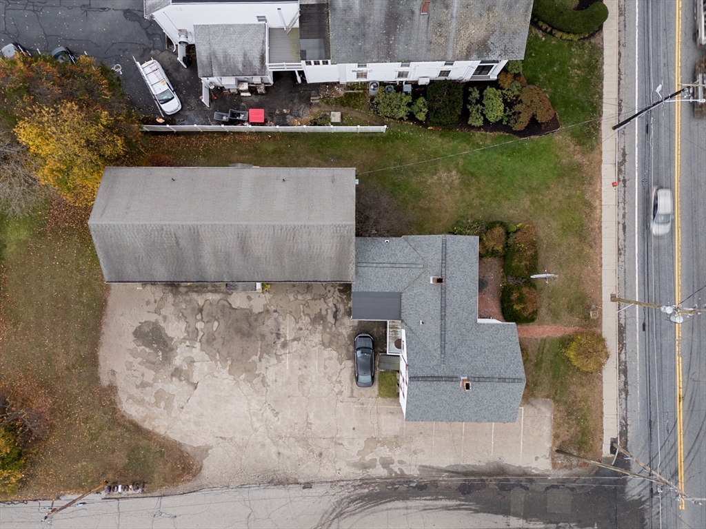 504 Main Street Sturbridge, MA 01518 - Photo 6 of 25 an aerial view of a house with a yard