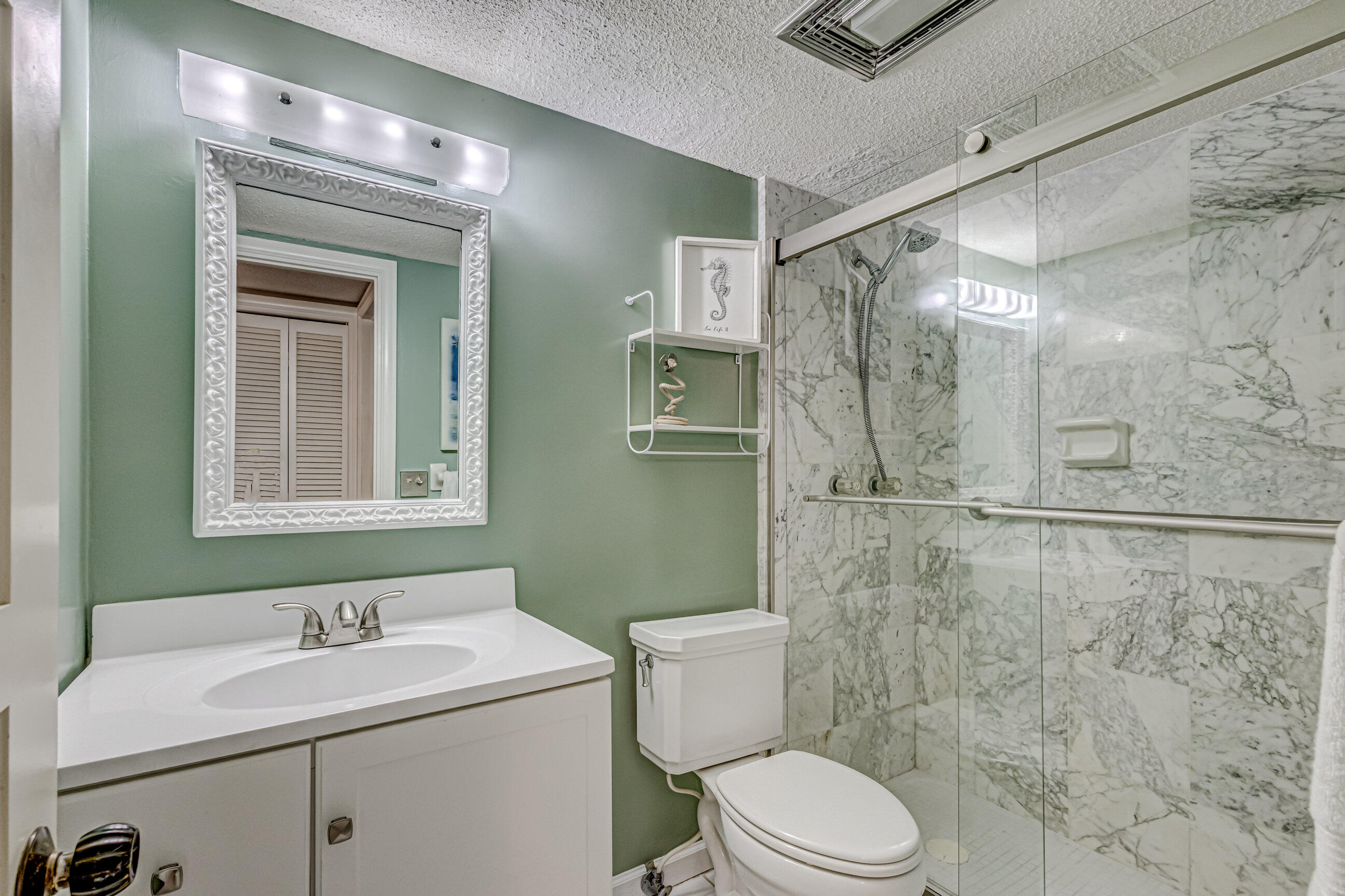 1201 Sugar Sands Boulevard, Unit 5 Singer Island, FL 33404 - Photo 32 of 51 GUEST BATH