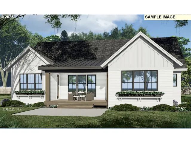 a view of a house with backyard porch and sitting area