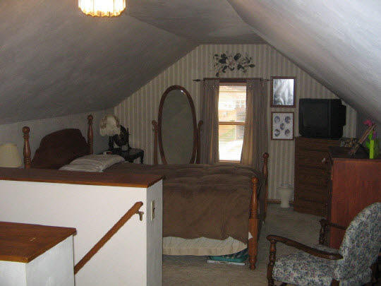 210 South 10th Street Rochelle, IL 61068 - Photo 4 of 7 a view of a livingroom with a dishwasher and furniture