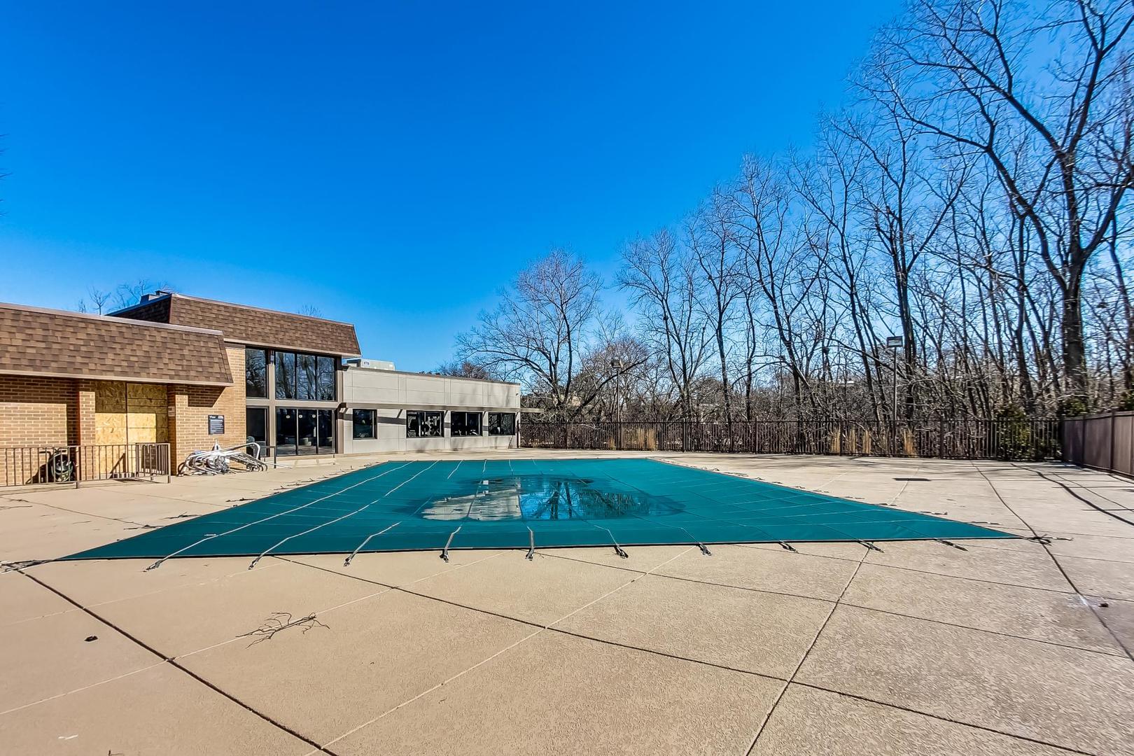 2020 Chestnut Avenue, Unit 312 Glenview, IL 60025 - Photo 29 of 34 a house with yard in front of it