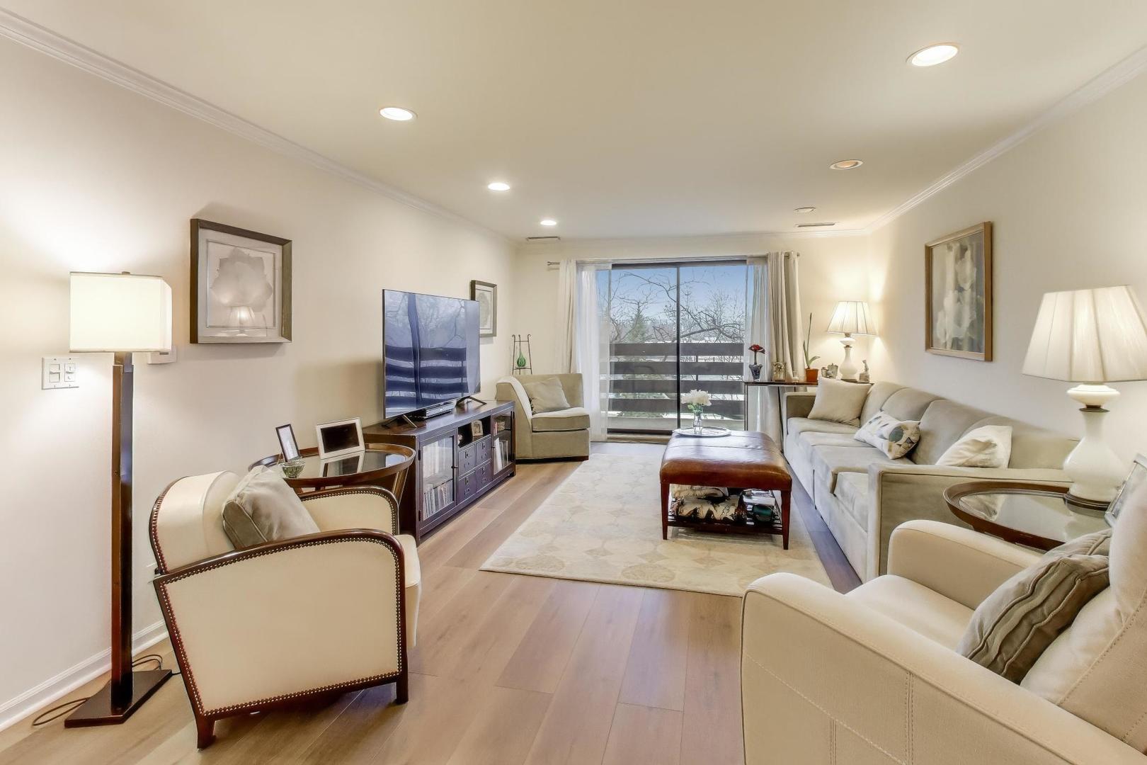 2020 Chestnut Avenue, Unit 312 Glenview, IL 60025 - Photo 5 of 34 a living room with furniture and a wooden floor