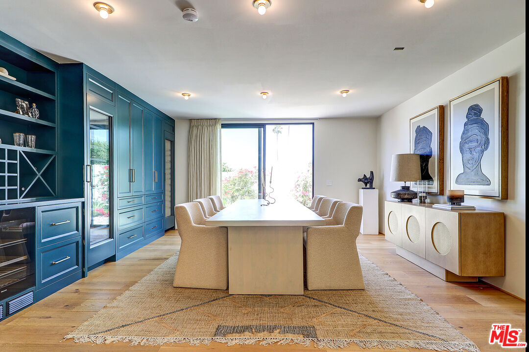 8674 Edwin Drive Los Angeles, CA 90046 - Photo 14 of 53 a view of living room kitchen with stainless steel appliances granite countertop cabinets and flat screen tv