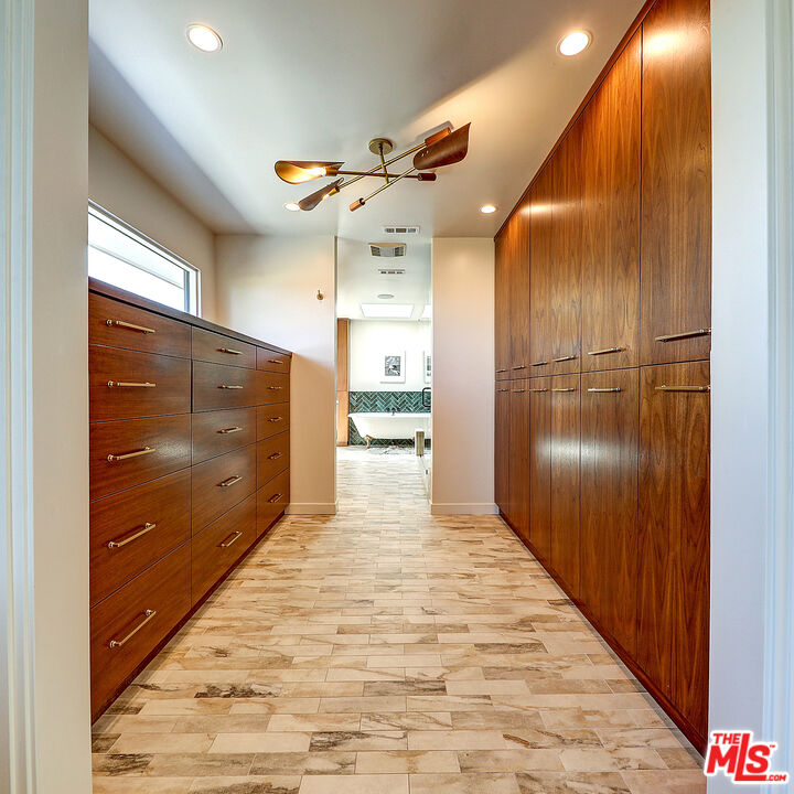 8674 Edwin Drive Los Angeles, CA 90046 - Photo 32 of 53 a view of a hallway with wooden floor