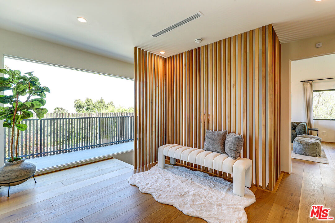 8674 Edwin Drive Los Angeles, CA 90046 - Photo 35 of 53 a living room with furniture and wooden floor