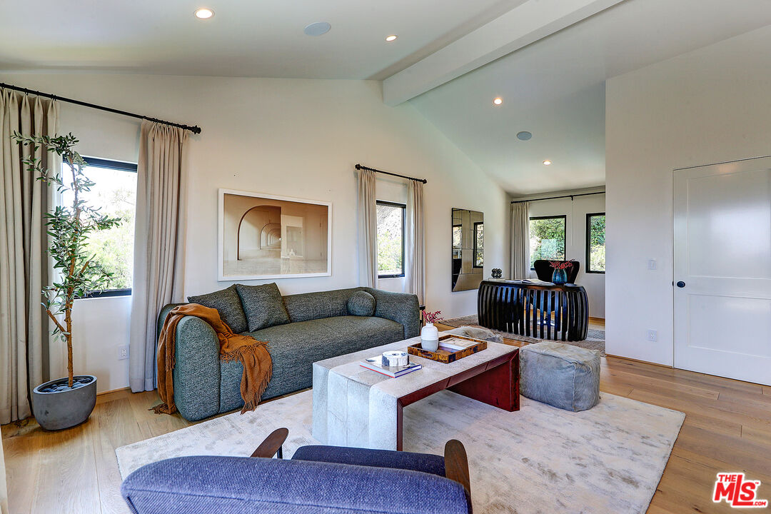 8674 Edwin Drive Los Angeles, CA 90046 - Photo 36 of 53 a living room with furniture