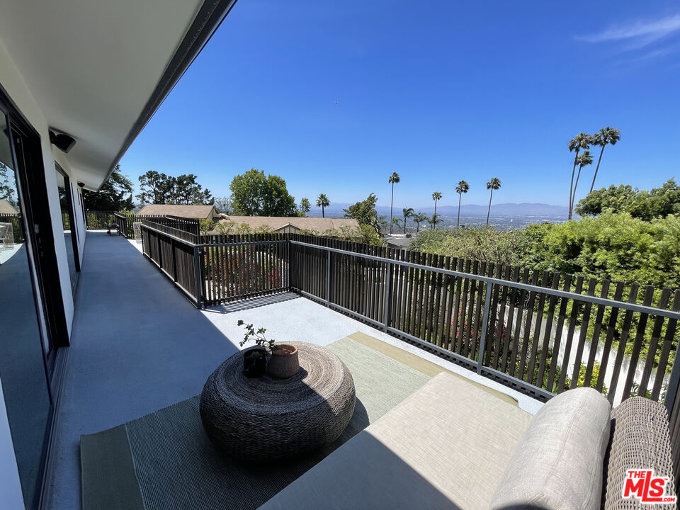 8674 Edwin Drive Los Angeles, CA 90046 - Photo 41 of 53 a view of a balcony with furniture