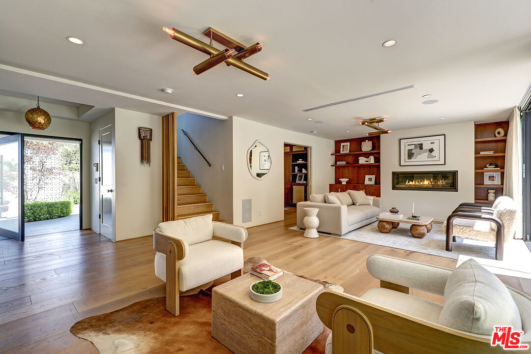 8674 Edwin Drive Los Angeles, CA 90046 - Photo 5 of 53 a living room with furniture and a wooden floor