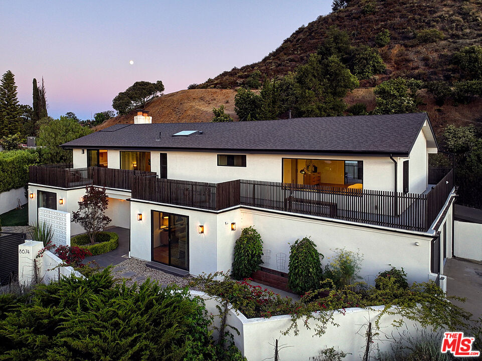 8674 Edwin Drive Los Angeles, CA 90046 - Photo 52 of 53 a front view of a house with garden