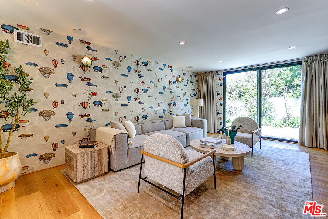8674 Edwin Drive Los Angeles, CA 90046 - Photo 6 of 53 a living room with furniture and a large window