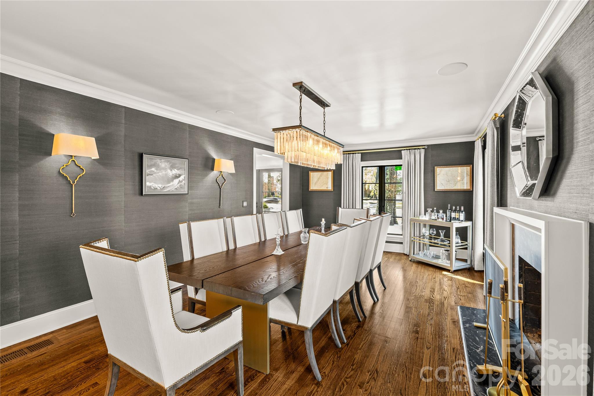 1935 Queens Road West Charlotte, NC 28207 - Photo 12 of 48 a dining room with furniture a rug and wooden floor