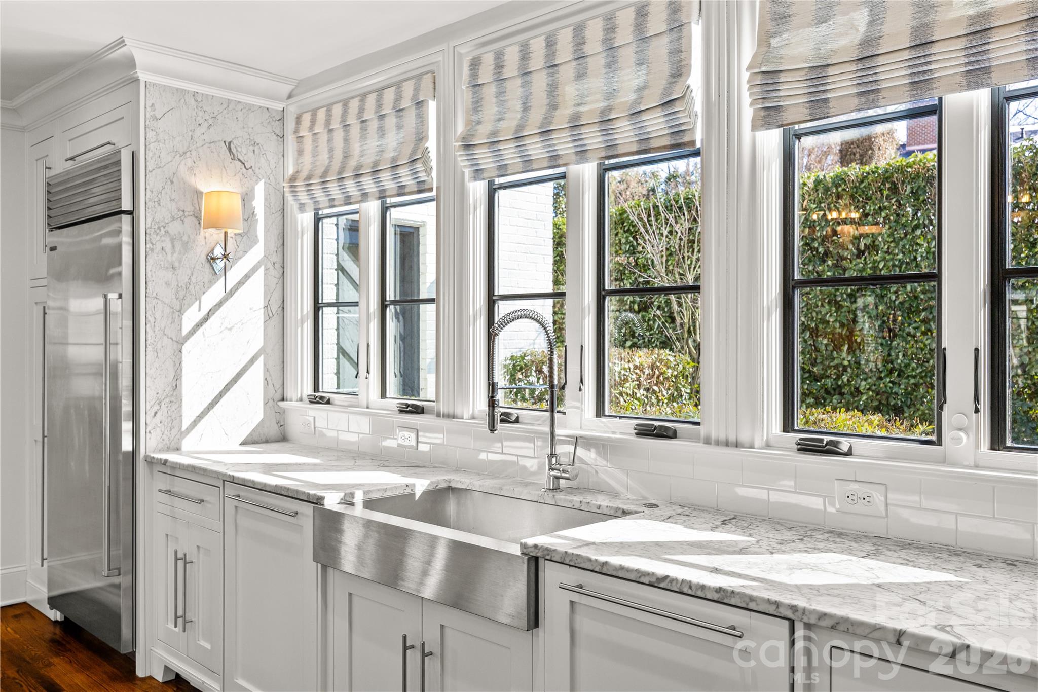 1935 Queens Road West Charlotte, NC 28207 - Photo 15 of 48 a view of a kitchen with granite countertop a sink and a window