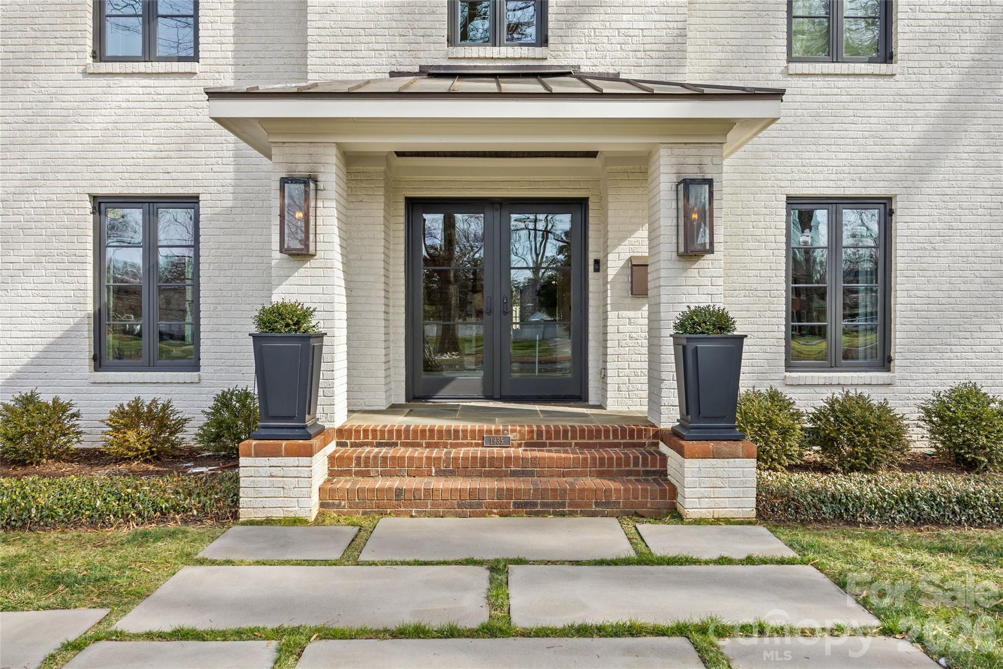 1935 Queens Road West Charlotte, NC 28207 - Photo 2 of 48 a front view of a house