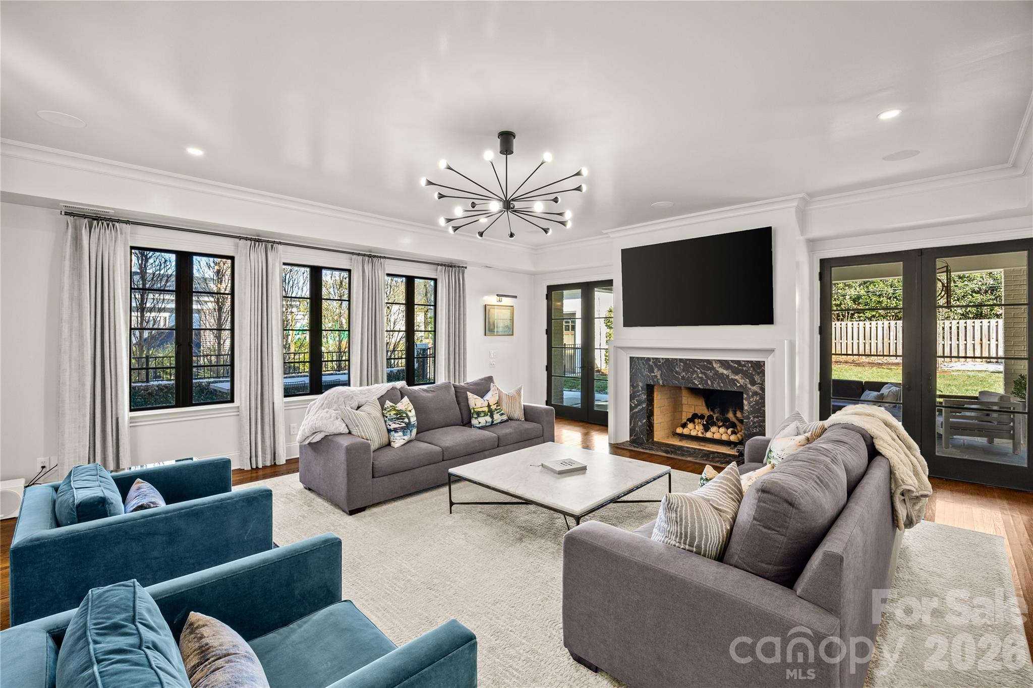 1935 Queens Road West Charlotte, NC 28207 - Photo 25 of 48 a living room with furniture fireplace and a large window