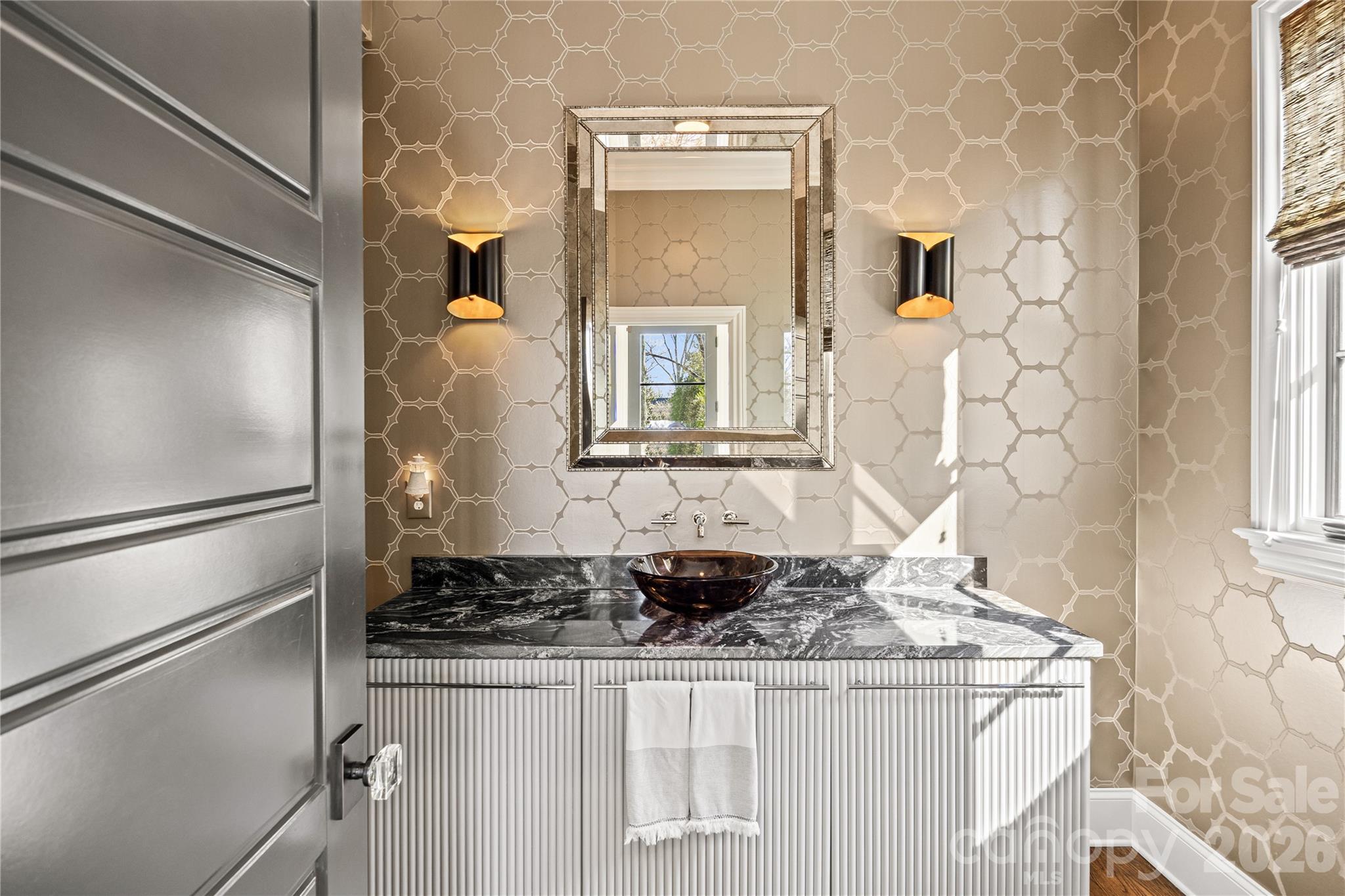 1935 Queens Road West Charlotte, NC 28207 - Photo 27 of 48 a bathroom with a granite countertop sink and a mirror