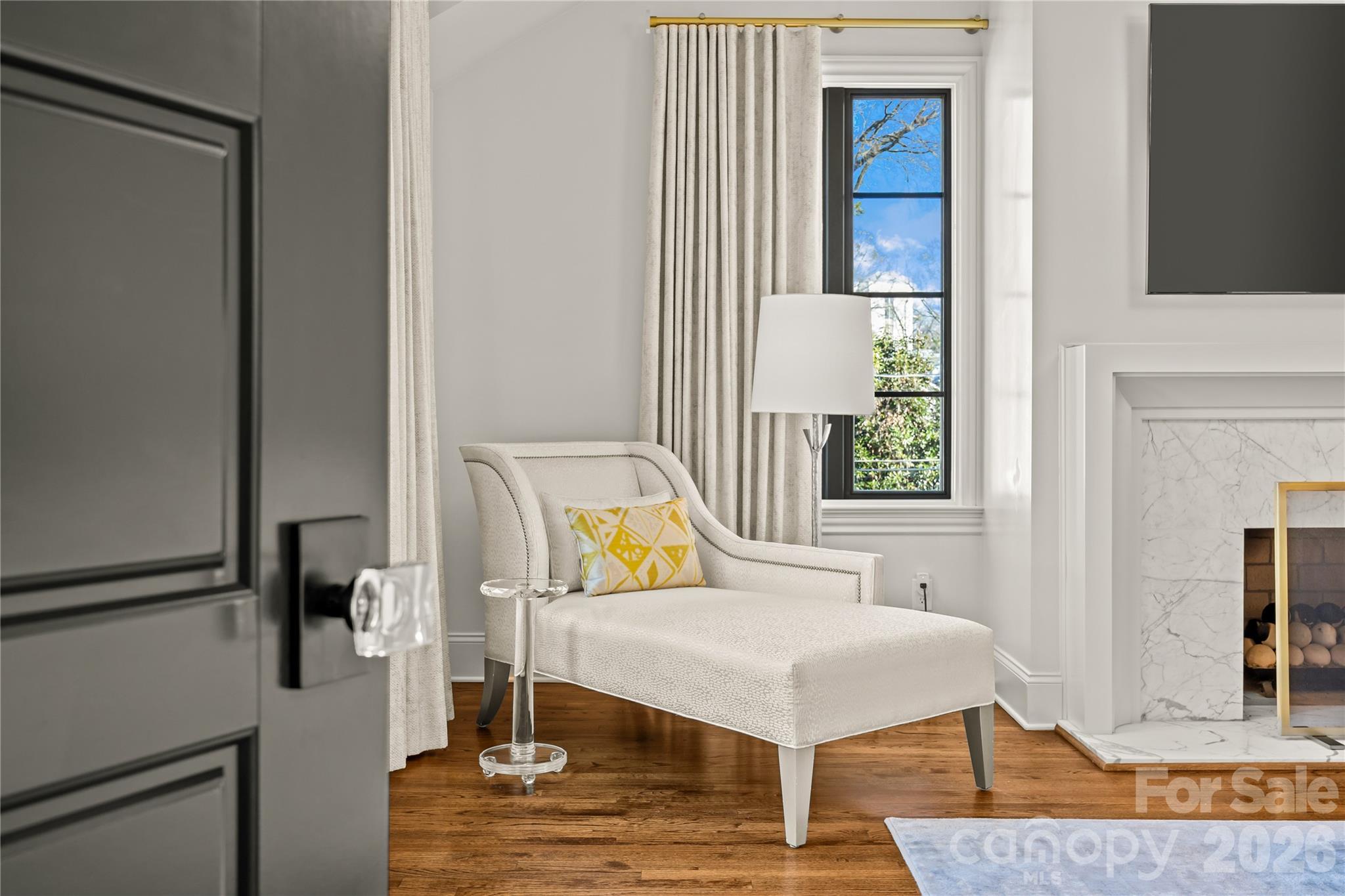 1935 Queens Road West Charlotte, NC 28207 - Photo 29 of 48 a living room with a couch and a table