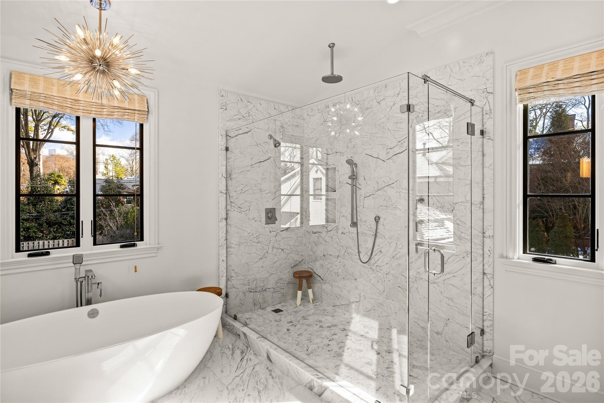 1935 Queens Road West Charlotte, NC 28207 - Photo 33 of 48 a bathroom with a bathtub shower and sink