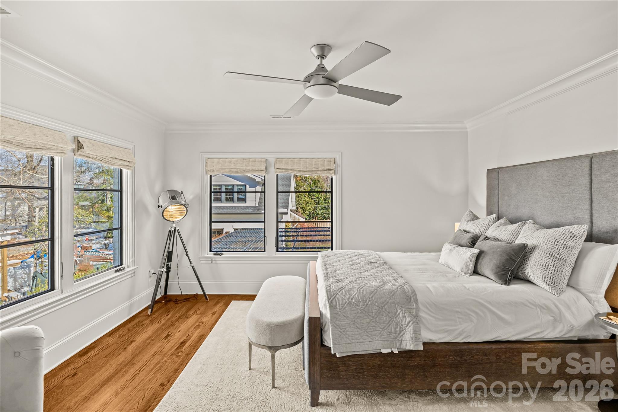1935 Queens Road West Charlotte, NC 28207 - Photo 41 of 48 a bedroom with a bed and a large window with outer view