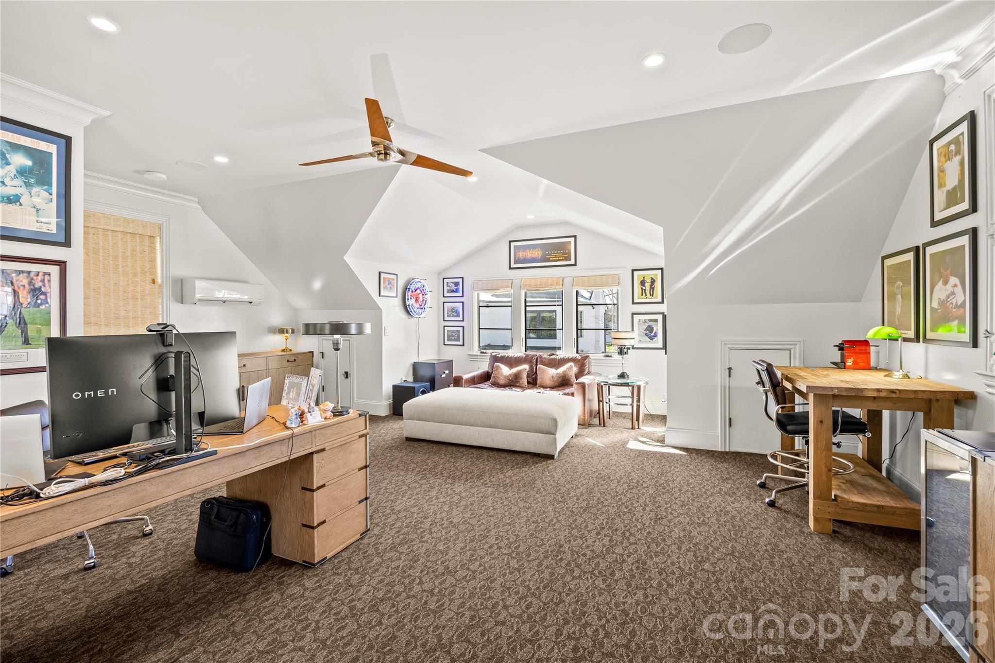 1935 Queens Road West Charlotte, NC 28207 - Photo 45 of 48 a living room with furniture and a flat screen tv