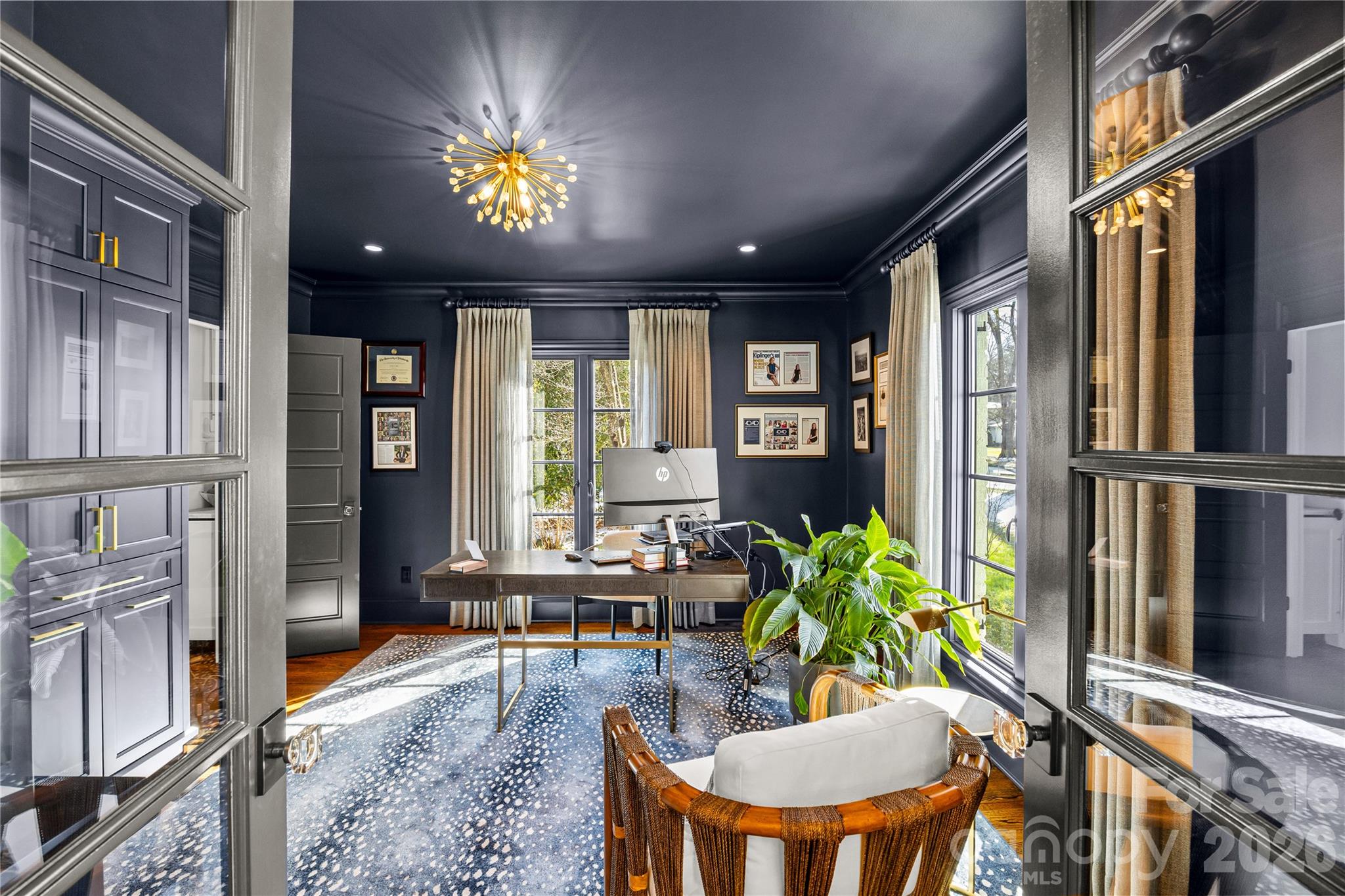 1935 Queens Road West Charlotte, NC 28207 - Photo 9 of 48 a lobby with furniture and chandelier