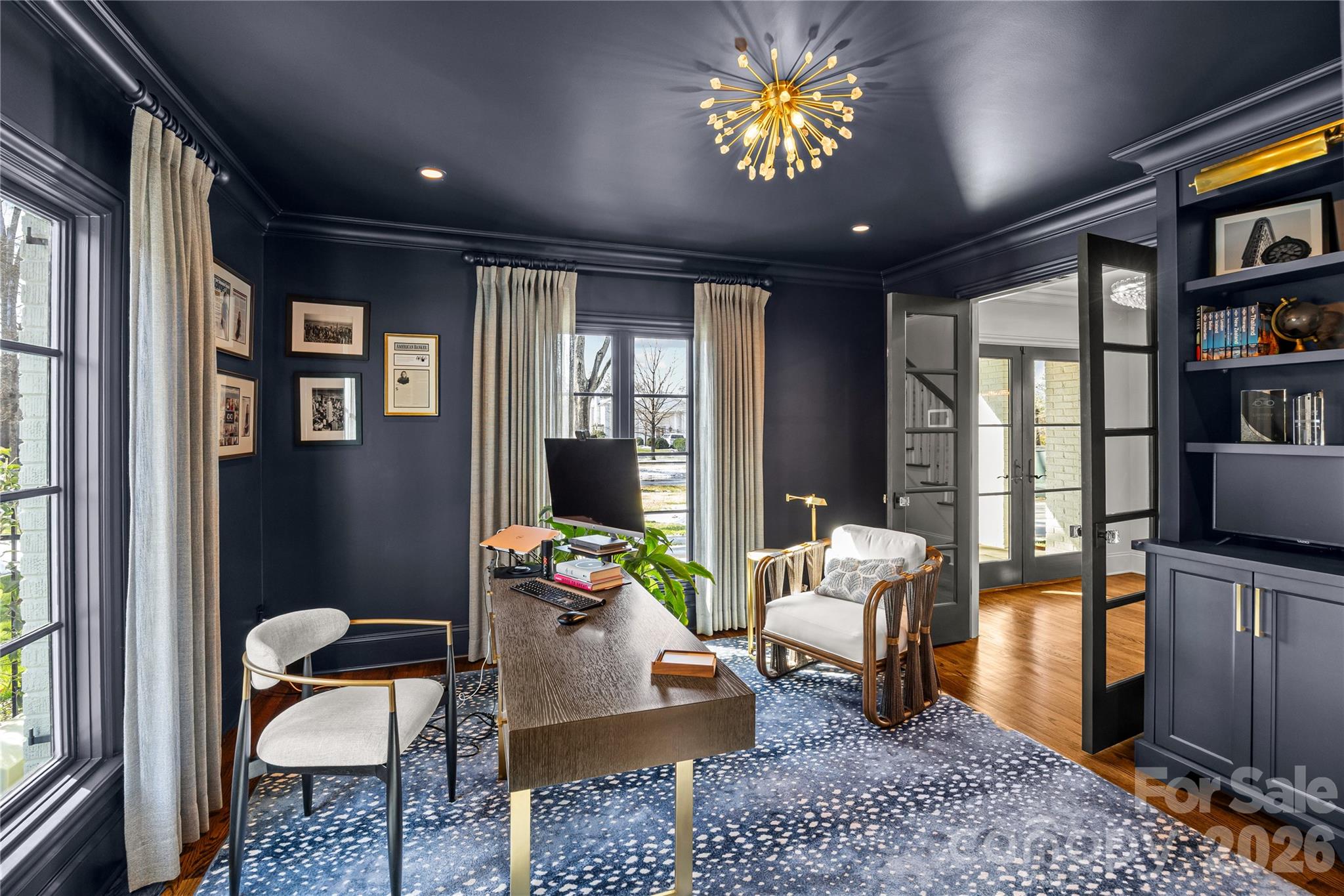 1935 Queens Road West Charlotte, NC 28207 - Photo 10 of 48 a living room with furniture and a potted plant