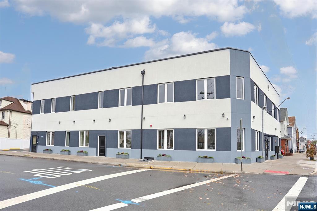 a view of a building with a street