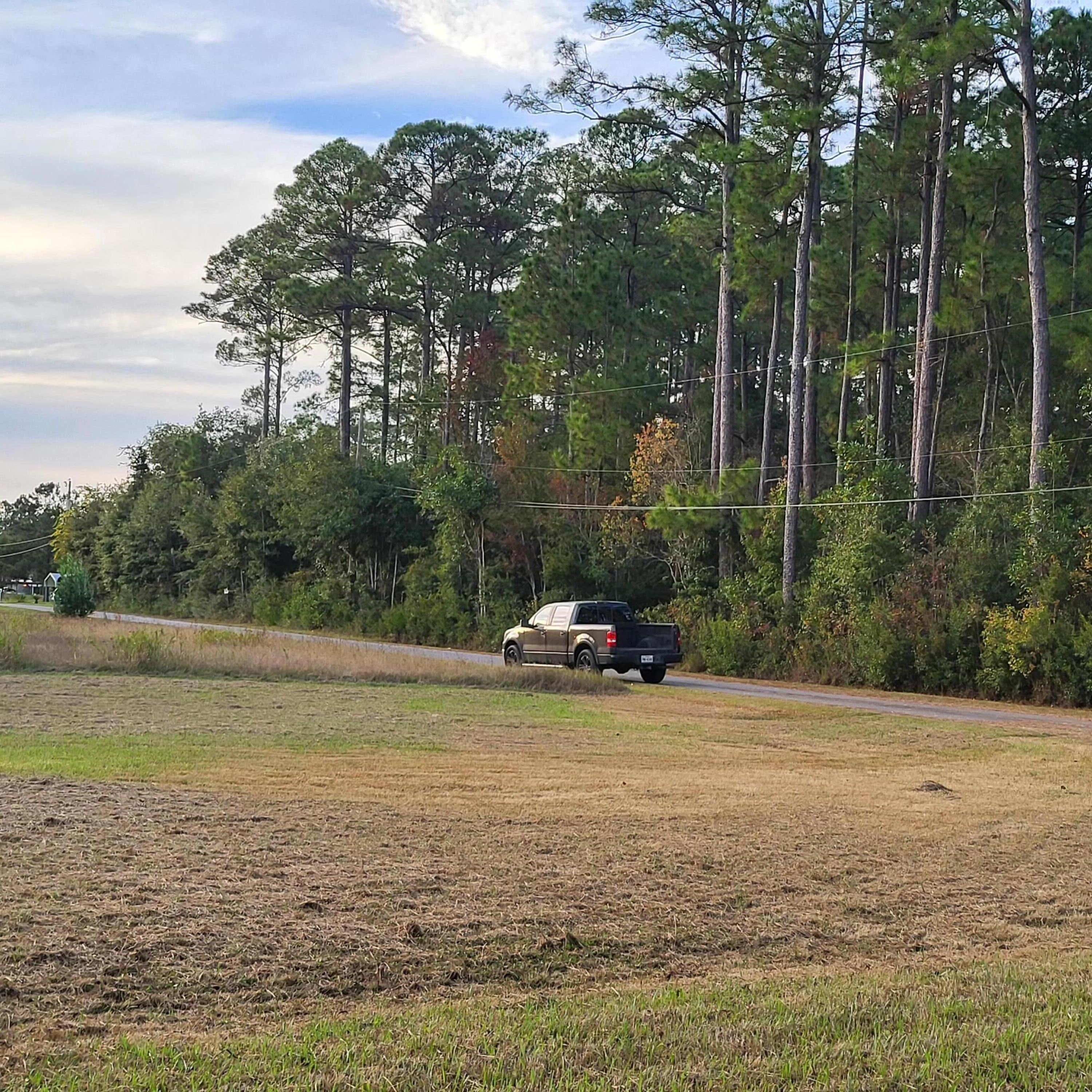 Tbd Owensville Road Milton, FL 32583 - Photo 2 of 5 a view of a lake with a car parked in the ocean