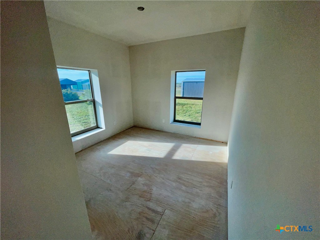 29 Carrie Street Port O'Connor, TX 77982 - Photo 19 of 29 a view of an empty room with a window