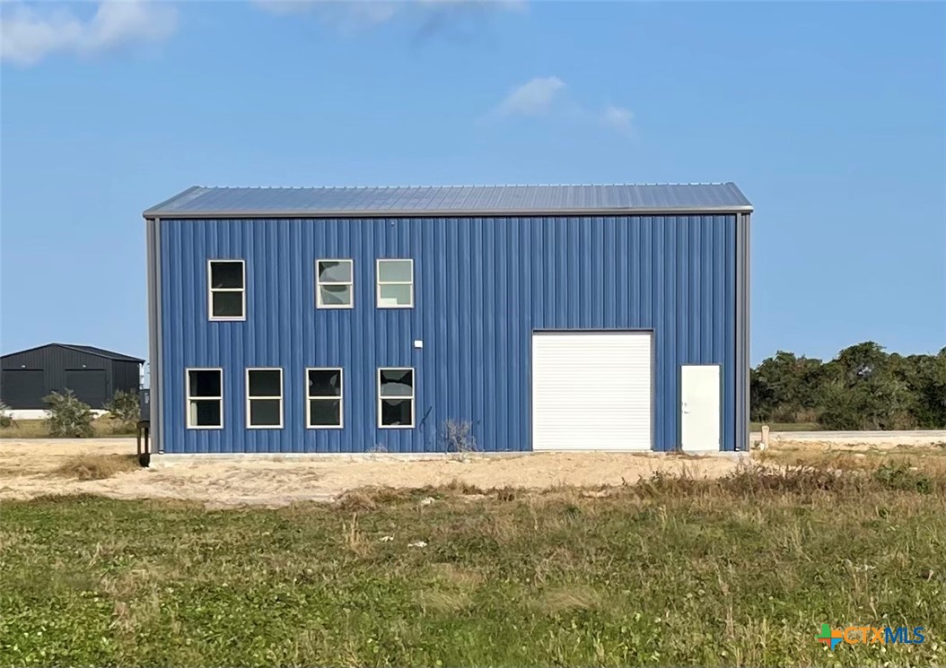 29 Carrie Street Port O'Connor, TX 77982 - Photo 27 of 29 a view of a house with a outdoor space