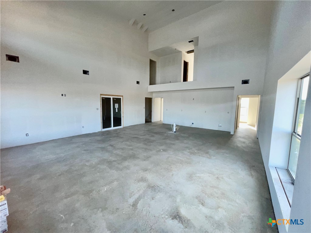 29 Carrie Street Port O'Connor, TX 77982 - Photo 8 of 29 an empty room with windows