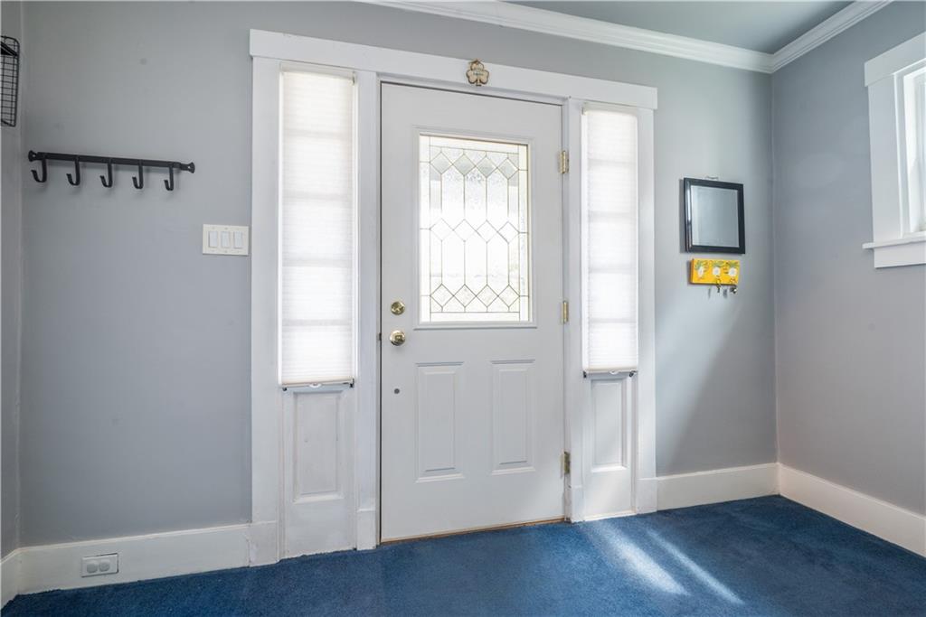 1819 Viruth Street Pittsburgh, PA 15212 - Photo 3 of 50 an empty room with wooden floor and window