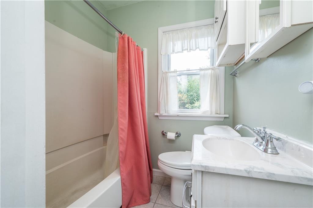 1819 Viruth Street Pittsburgh, PA 15212 - Photo 36 of 50 a bathroom with a sink toilet and shower