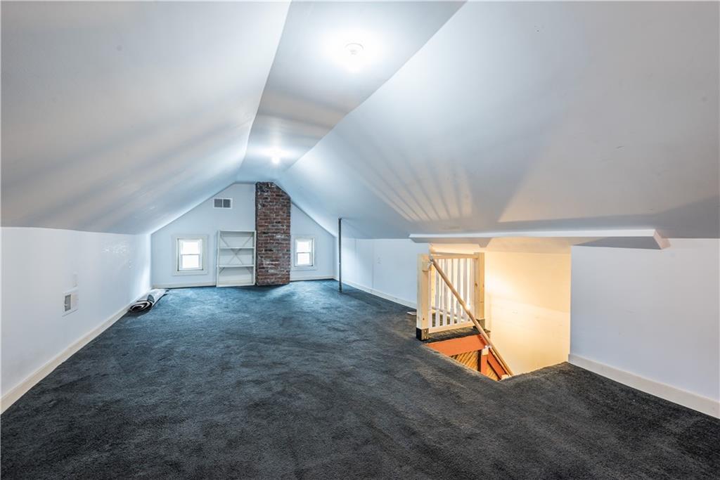 1819 Viruth Street Pittsburgh, PA 15212 - Photo 37 of 50 en empty room with windows and pillars in it