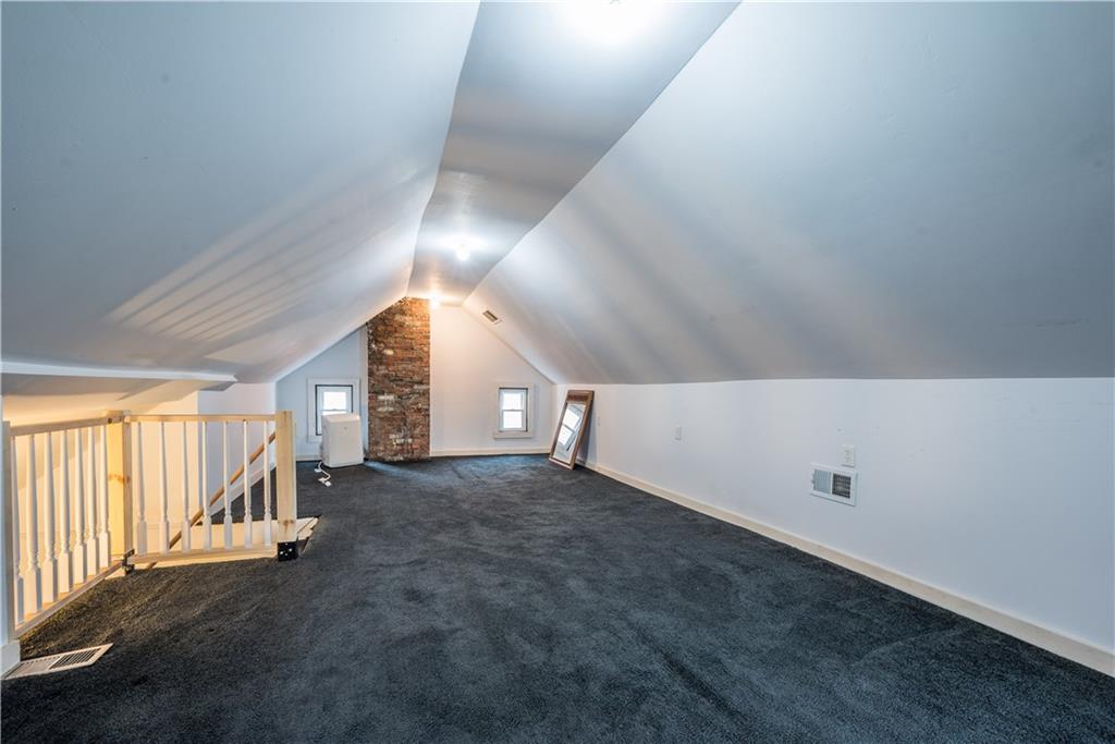 1819 Viruth Street Pittsburgh, PA 15212 - Photo 39 of 50 wooden floor in an empty room with a window