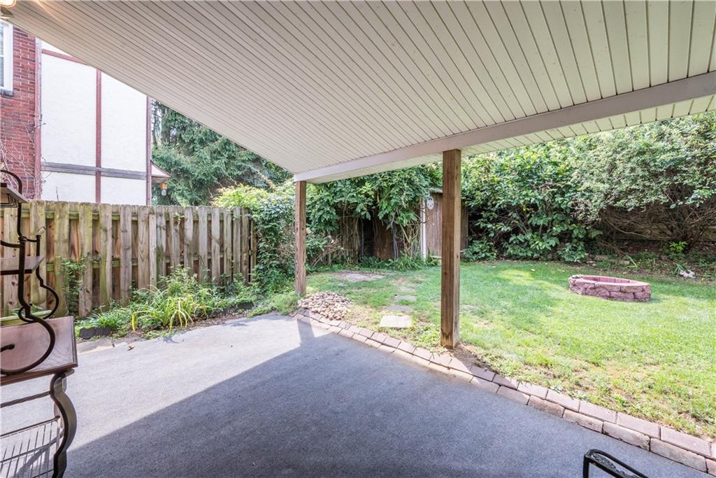 1819 Viruth Street Pittsburgh, PA 15212 - Photo 46 of 50 a backyard of a house with garden and outdoor seating