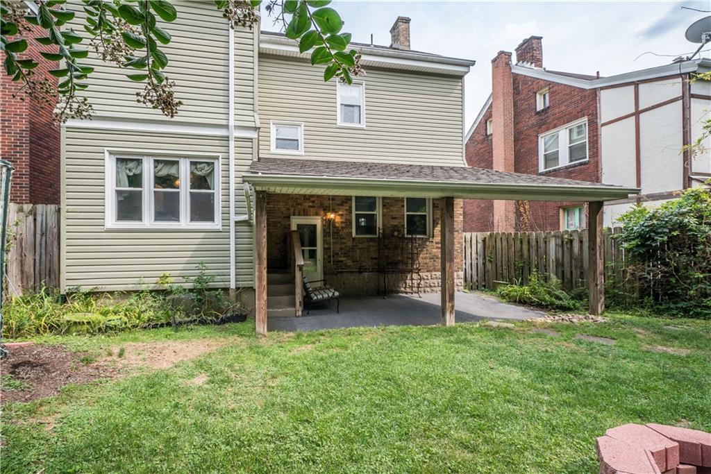 1819 Viruth Street Pittsburgh, PA 15212 - Photo 47 of 50 a view of a house with backyard and porch