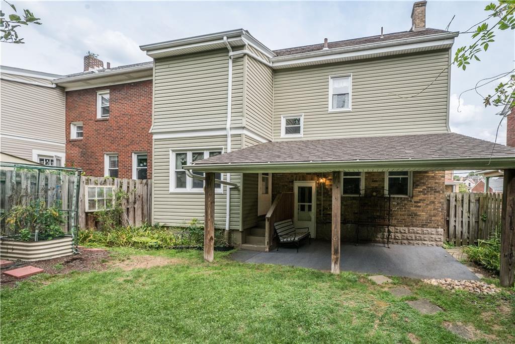 1819 Viruth Street Pittsburgh, PA 15212 - Photo 48 of 50 a view of a house with backyard and porch