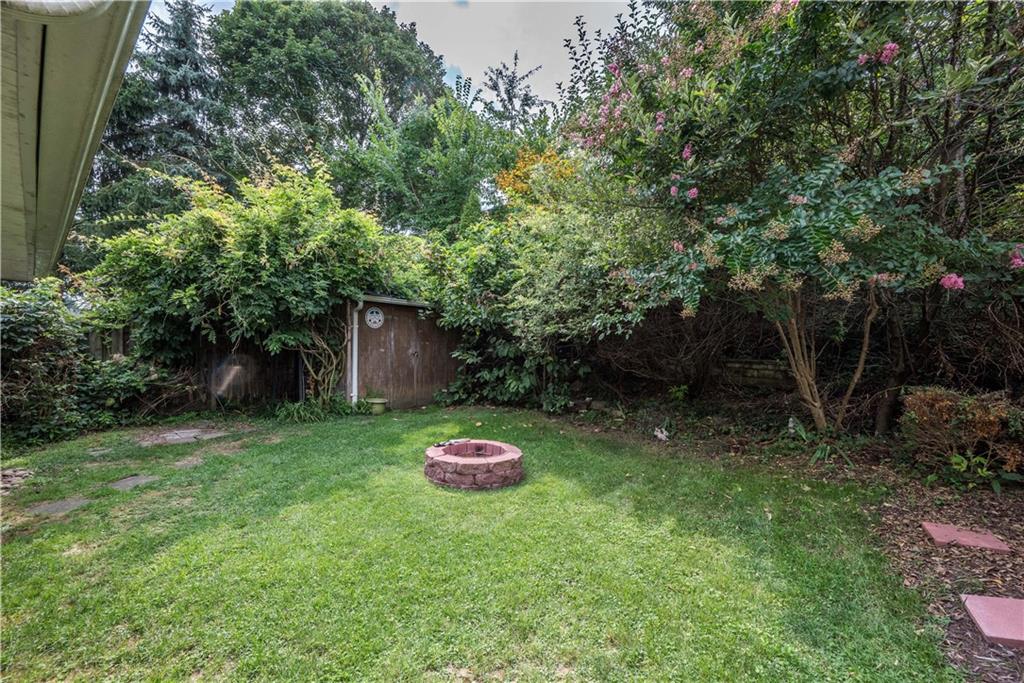 1819 Viruth Street Pittsburgh, PA 15212 - Photo 50 of 50 a backyard of a house with table and chairs