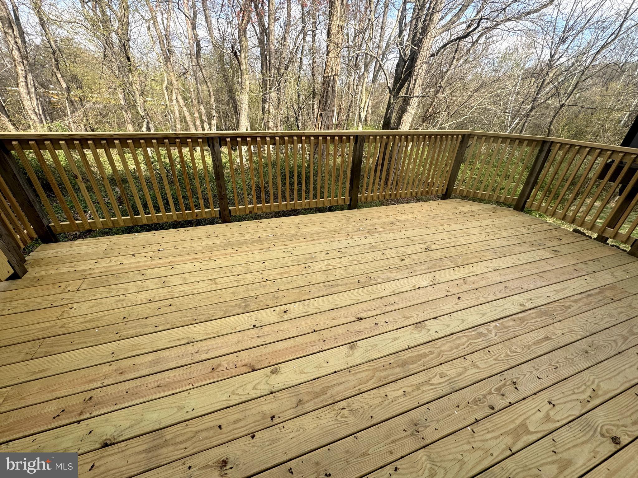 9 East Ridge Mews Newtown, PA 18940 - Photo 12 of 32 Big deck with view of nature