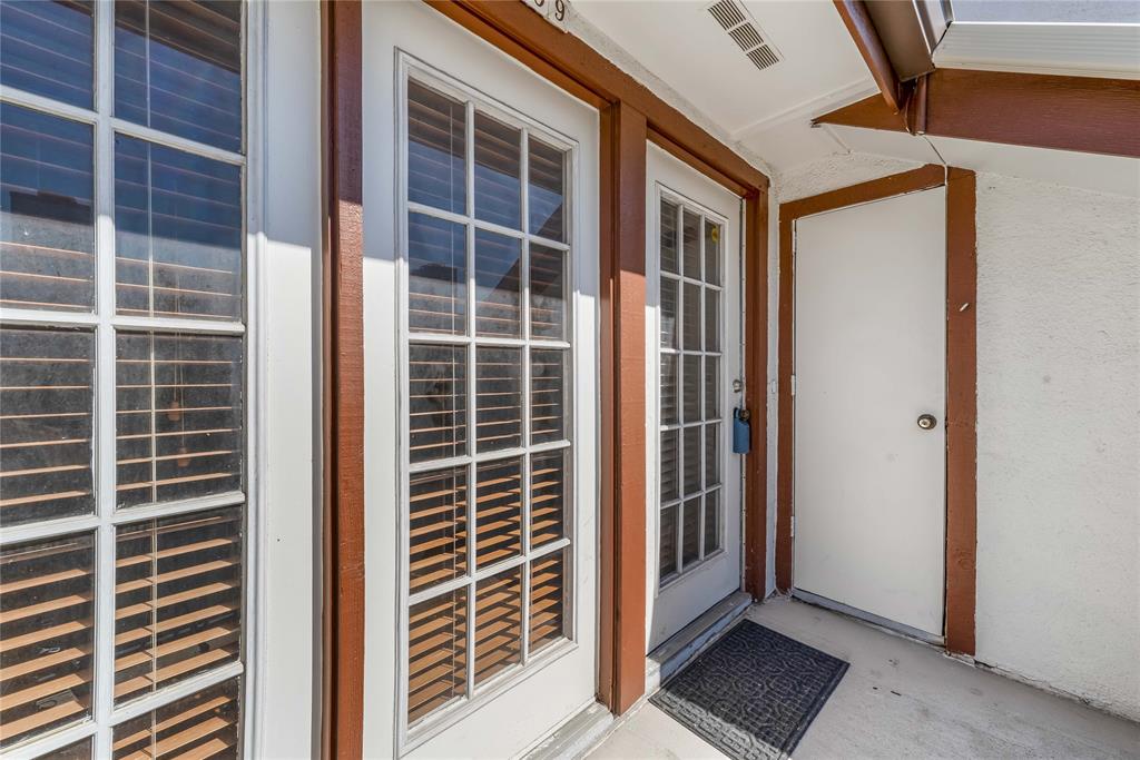 13217 Emily Road, Unit 3209 Dallas, TX 75240 - Photo 18 of 26 a view of front door and porch