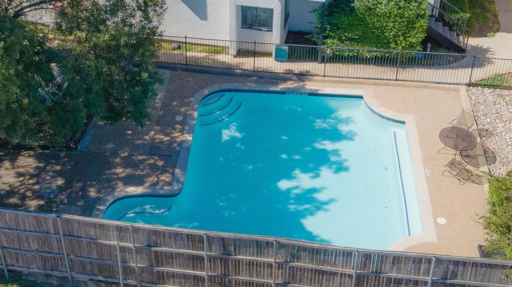13217 Emily Road, Unit 3209 Dallas, TX 75240 - Photo 24 of 26 a view of yard from a balcony
